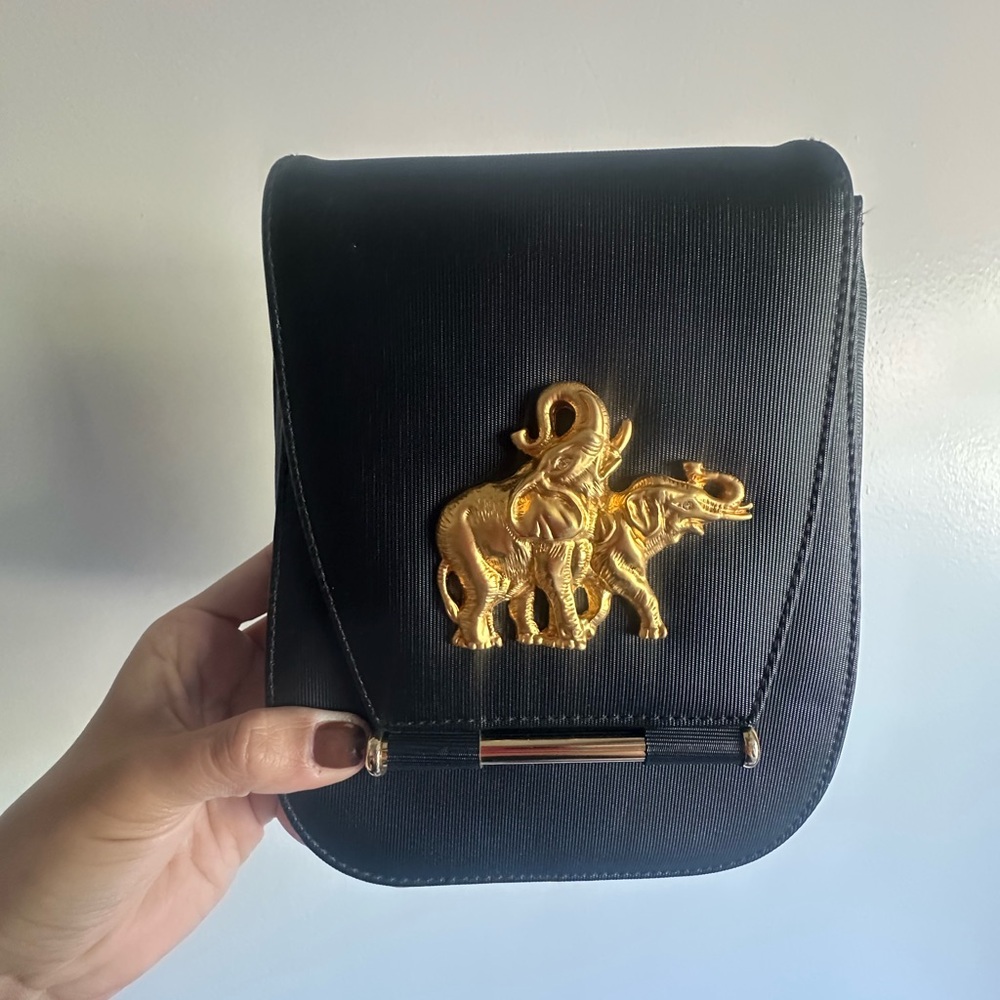 Nima Elegant Black Crossbody Bag with Gold Elephant Accent